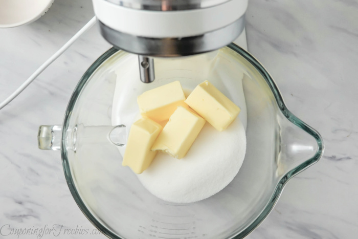 Mix butter and sugar in mixer