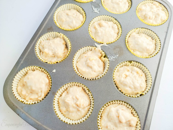 Muffin batter in lined muffin pan