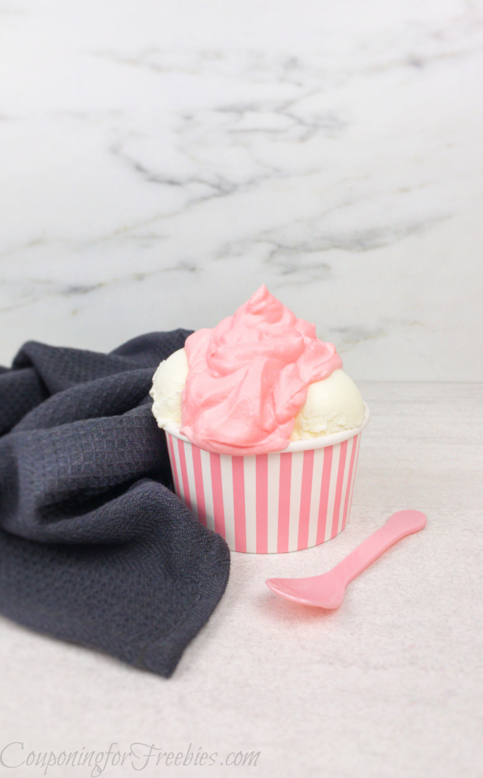 whipped strawberry sundae in pink and white paper dish